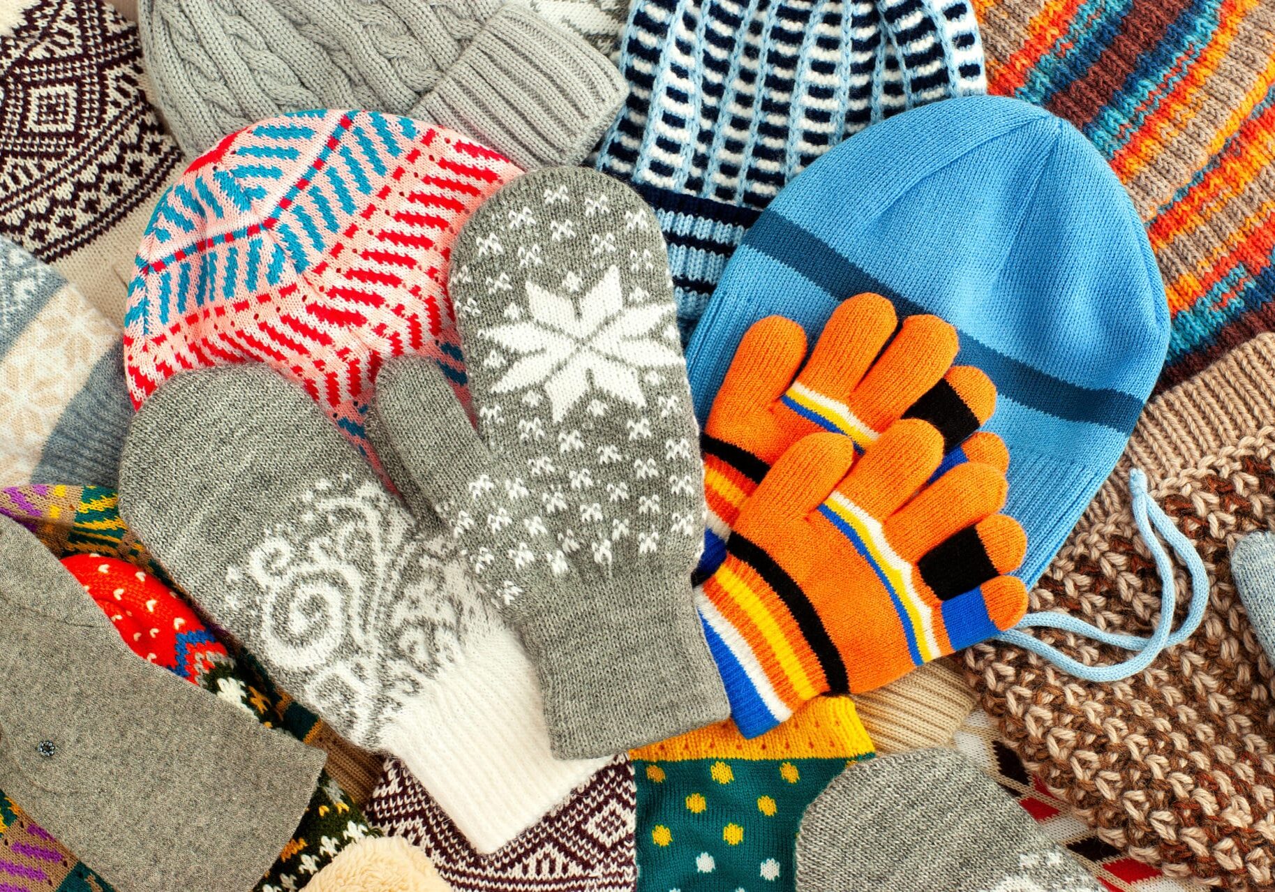 Colorful hats, mittens and gloves